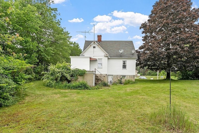 74 W Main St, Westminster, MA 01473 - rear view of house featuring a yard and a chimney