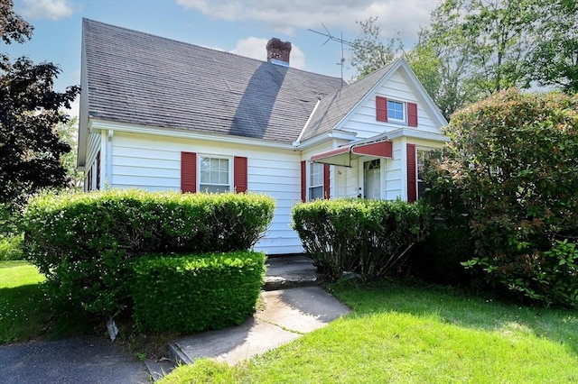 74 W Main St, Westminster, MA 01473 - view of front of property with a front yard and a chimney