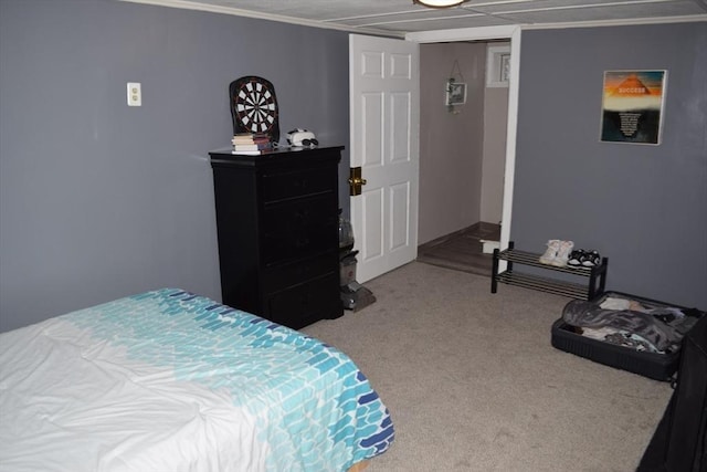 carpeted bedroom with crown molding