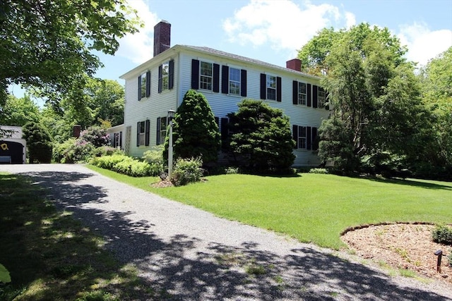 view of front of property with a front lawn