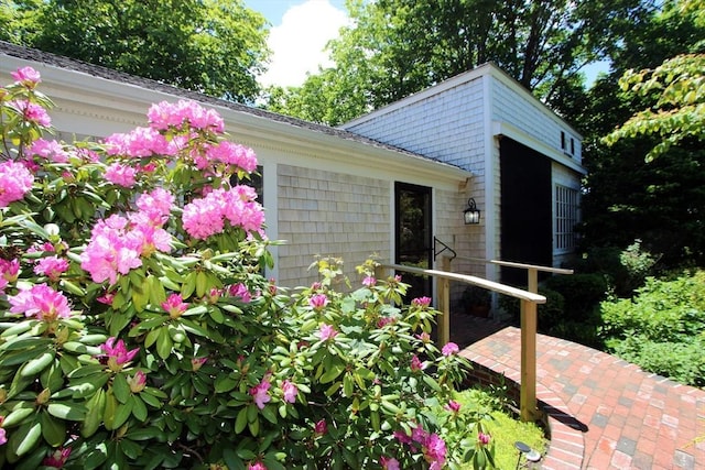 view of property exterior with a patio