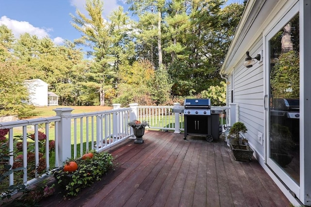 deck featuring a yard