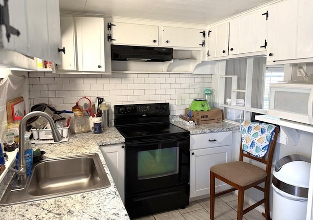 626 Nashua Rd, Dracut, MA 01826 - kitchen with white cabinets, a sink, black electric range oven, and tasteful backsplash