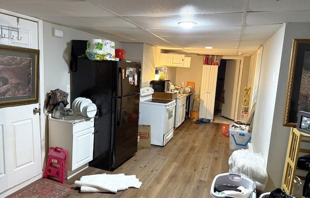 626 Nashua Rd, Dracut, MA 01826 - kitchen featuring freestanding refrigerator, light wood-style floors, a drop ceiling, white cabinets, and white electric stove