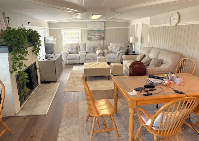 626 Nashua Rd, Dracut, MA 01826 - interior space with beam ceiling, hardwood / wood-style flooring, and a fireplace