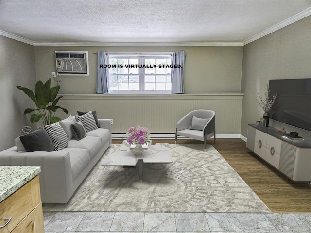 living area with ornamental molding, wood finished floors, a textured ceiling, and a wall mounted AC