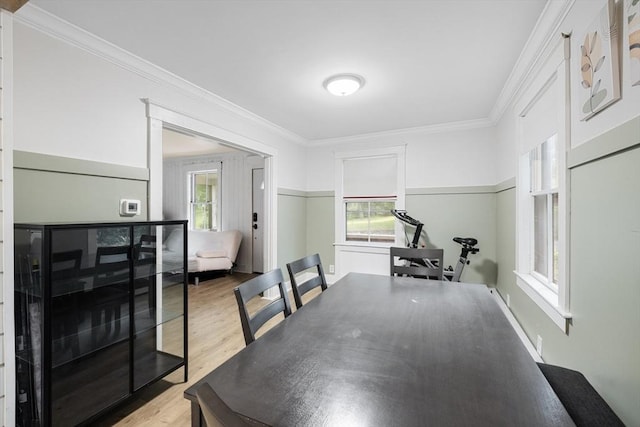 486 Franklin St, Reading, MA 01867 - dining space featuring light wood-type flooring, healthy amount of natural light, and crown molding