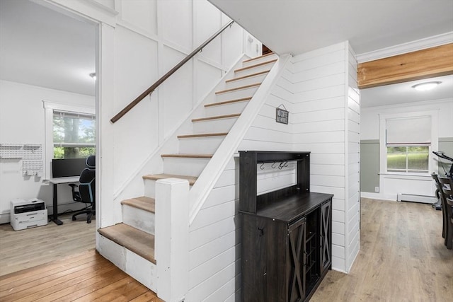 486 Franklin St, Reading, MA 01867 - stairway featuring hardwood / wood-style flooring, plenty of natural light, crown molding, and a baseboard heating unit