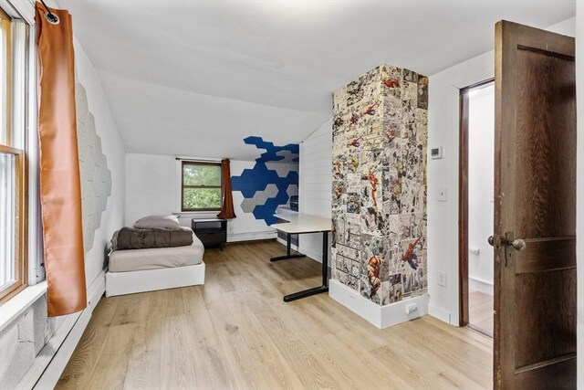 486 Franklin St, Reading, MA 01867 - sitting room featuring wood finished floors and vaulted ceiling
