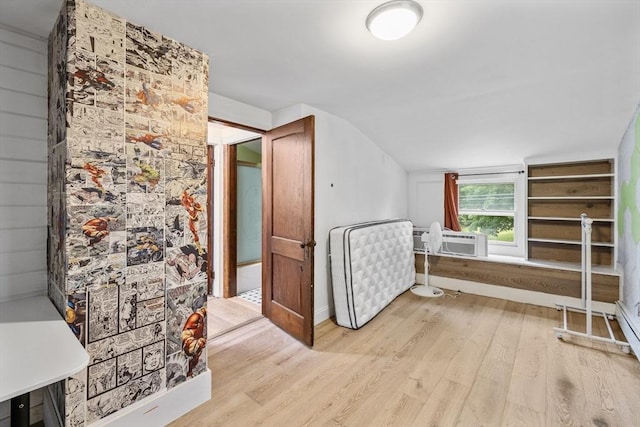 486 Franklin St, Reading, MA 01867 - additional living space with wood finished floors, lofted ceiling, and cooling unit