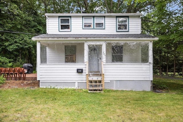 486 Franklin St, Reading, MA 01867 - view of front facade featuring a front yard, roof with shingles, entry steps, and crawl space
