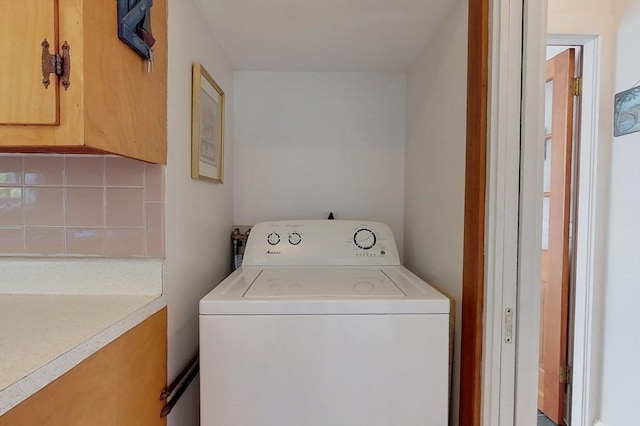 washroom featuring laundry area and washer / clothes dryer