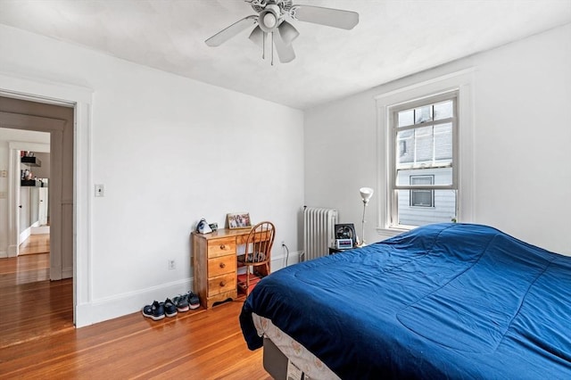 71 Ocean Ave Unit 3, Salem, MA 01970 - bedroom with radiator, wood finished floors, and ceiling fan