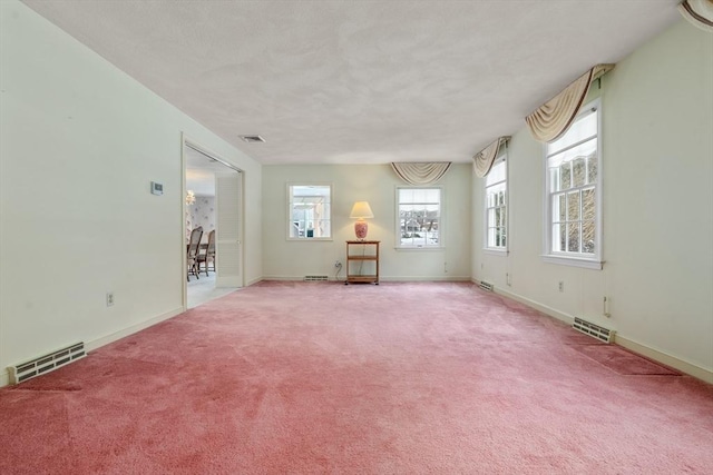12 Checkerberry Cir, Sudbury, MA 01776 - empty room featuring light colored carpet