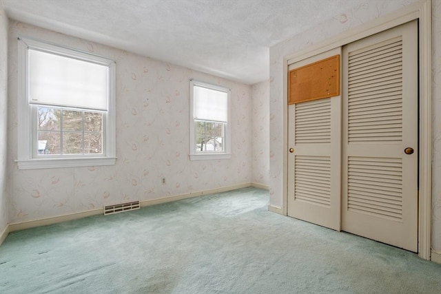12 Checkerberry Cir, Sudbury, MA 01776 - unfurnished bedroom with carpet floors and a closet
