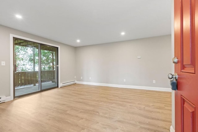 1029 Iyannough Rd Unit 9B, Barnstable, MA 02601 - spare room with light wood finished floors, baseboards, recessed lighting, and baseboard heating