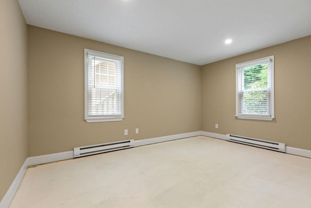 1029 Iyannough Rd Unit 9B, Barnstable, MA 02601 - empty room featuring a baseboard radiator, baseboards, and recessed lighting