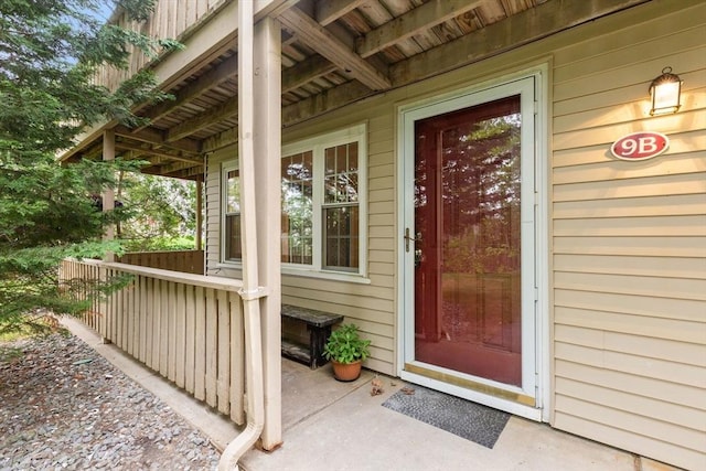 1029 Iyannough Rd Unit 9B, Barnstable, MA 02601 - view of exterior entry featuring covered porch