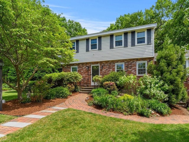5 Hansen Ave, Burlington, MA 01803 - view of front facade featuring a front yard and brick siding