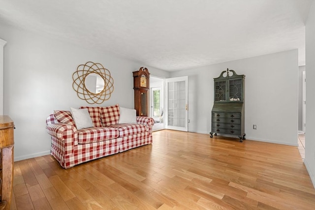 5 Hansen Ave, Burlington, MA 01803 - living area featuring light wood-style floors and baseboards