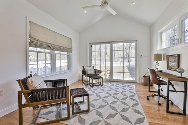 home office featuring a wealth of natural light, light wood-type flooring, and baseboards