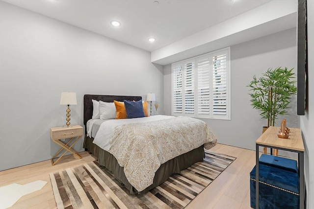 bedroom with light wood-type flooring