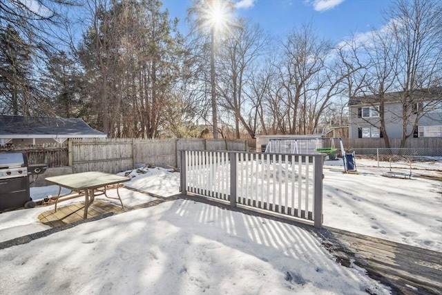 exterior space featuring a fenced backyard, a patio, and area for grilling