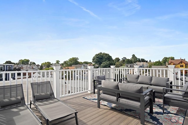 deck with an outdoor hangout area