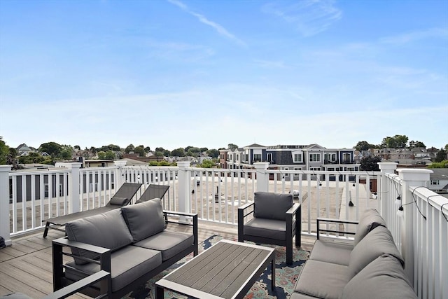 deck featuring an outdoor living space