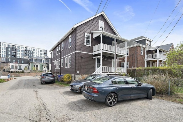 view of property with a balcony