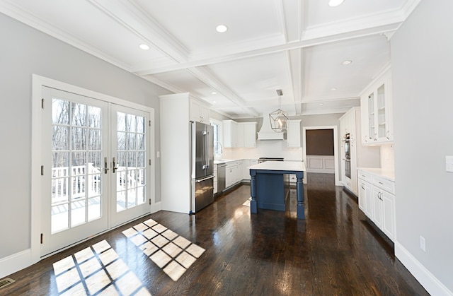 kitchen featuring french doors, dark hardwood / wood-style floors, and stainless steel appliances