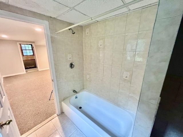 9 Brooks Rd, Sudbury, MA 01776 - bathroom with tub / shower combination, baseboards, and tile patterned floors