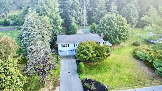 9 Brooks Rd, Sudbury, MA 01776 - drone / aerial view featuring a view of trees