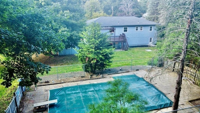 9 Brooks Rd, Sudbury, MA 01776 - view of swimming pool featuring a yard, a fenced backyard, stairway, a diving board, and a fenced in pool