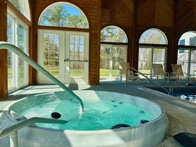 interior space featuring french doors and a hot tub