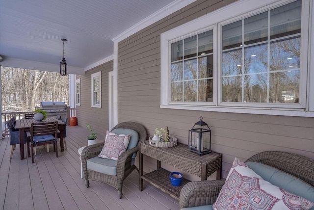 wooden deck with area for grilling