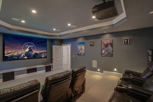 home theater featuring crown molding, light colored carpet, and a raised ceiling