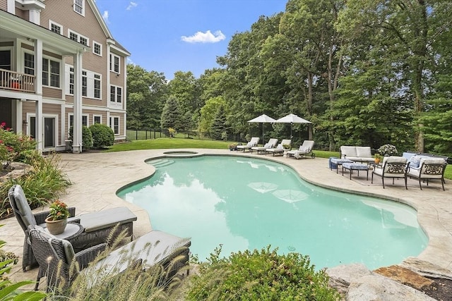 view of pool with a patio and an outdoor hangout area