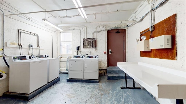 washroom featuring washer and dryer