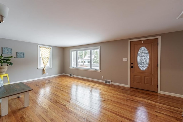 entrance foyer featuring light hardwood / wood-style floors