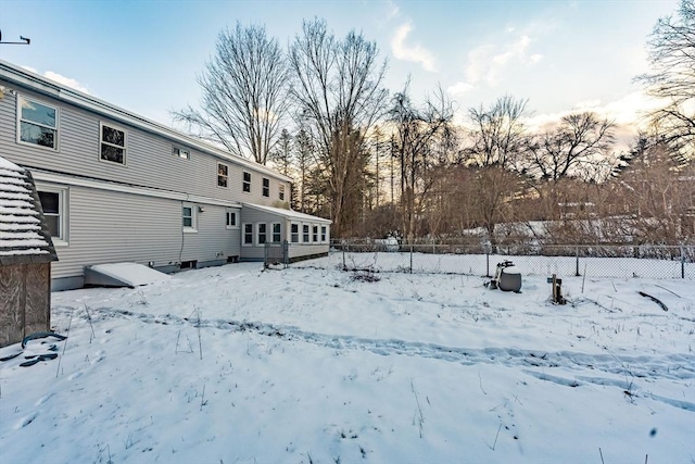 view of yard layered in snow