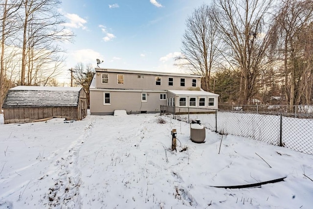 view of snow covered house