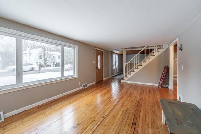 entrance foyer with light hardwood / wood-style floors