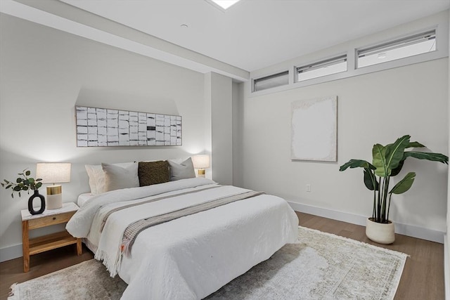 121 Portland St Unit 601, Boston, MA 02114 - bedroom with baseboards and wood finished floors