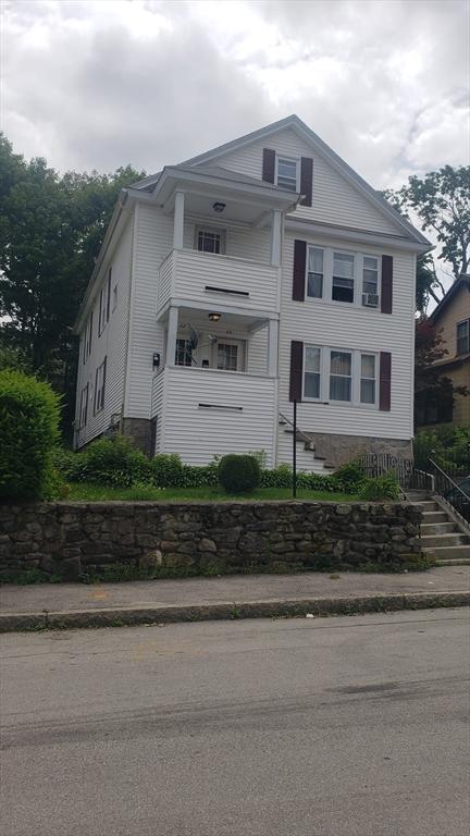 60 Everard St, Worcester, MA 01605 - view of front facade featuring stairway