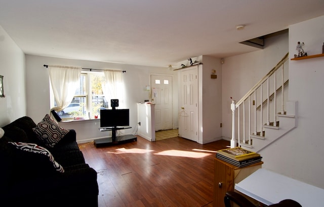 living room with hardwood / wood-style flooring