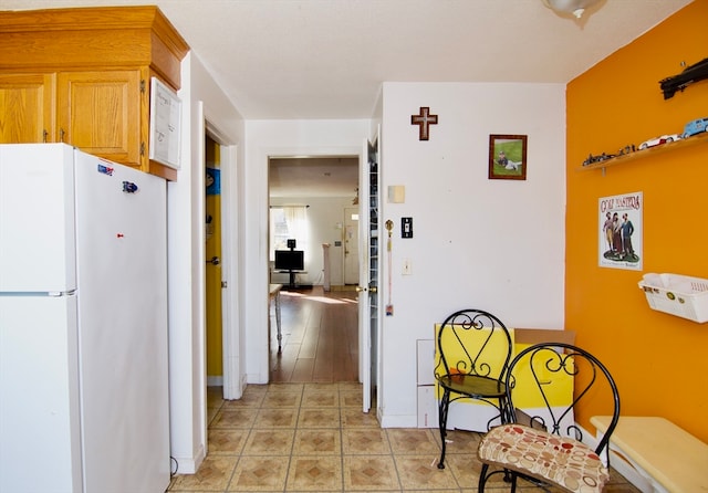 kitchen featuring white fridge