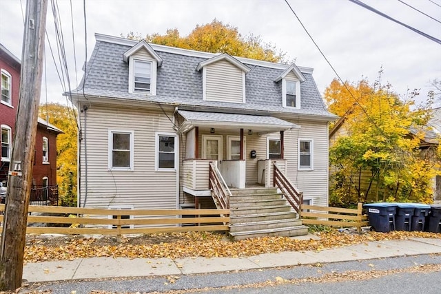 view of new england style home