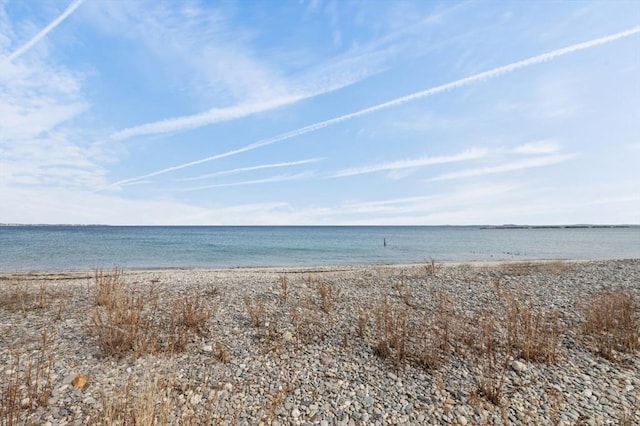 view of water feature with a beach view