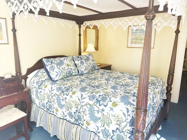 bedroom with ceiling fan and carpet